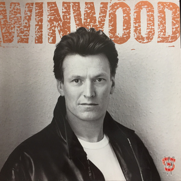 Steve Winwood — Roll With It vinyl record cover